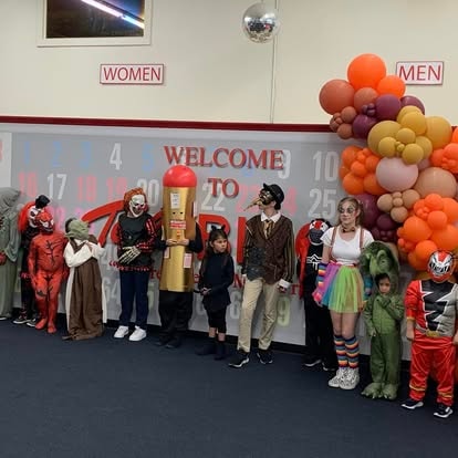 Children in Halloween costumes at a party