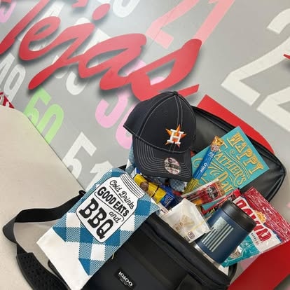 Astros baseball cap with fan merchandise