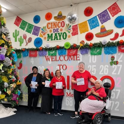 Group celebrating Cinco de Mayo indoors