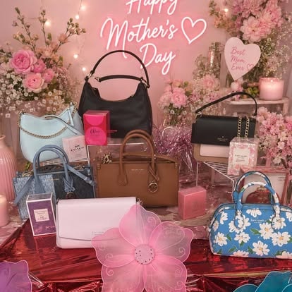 Mother's Day gift display with handbags and flowers